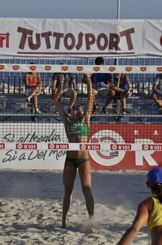 NAPLES - JULY 07: italian professional players have a competition at Italian beach volley female tournament on July 07, 2012 in Naples Italy