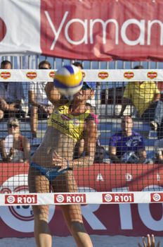 NAPLES - JULY 07: italian professional players have a competition at Italian beach volley female tournament on July 07, 2012 in Naples Italy