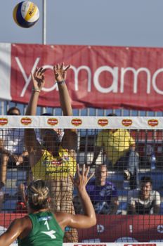 NAPLES - JULY 07: italian professional players have a competition at Italian beach volley female tournament on July 07, 2012 in Naples Italy