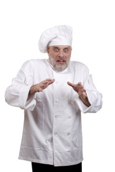 Portrait of a caucasian chef in his uniform on a white background.