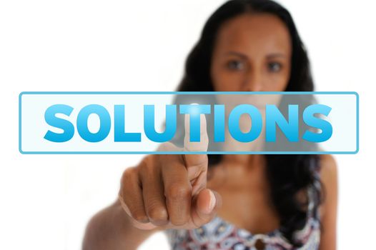 Young latin woman pointing at the Solutions sign. 