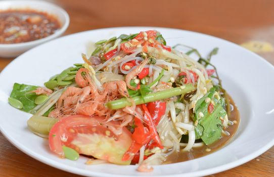 thai papaya salad hot and spicy , mixed from variety of vegetable