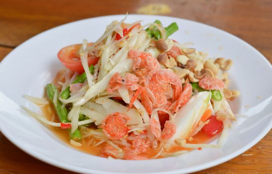 thai papaya salad hot and spicy ,mixed  vegetable and  dried salted prawn