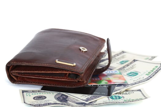 Wallet with dollars and credit cards, isolated on white background