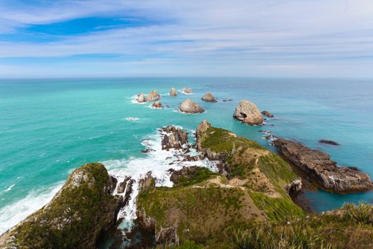Beautiful rugged rocky coastline of Nugget point in the Catlins on South island of New Zealand