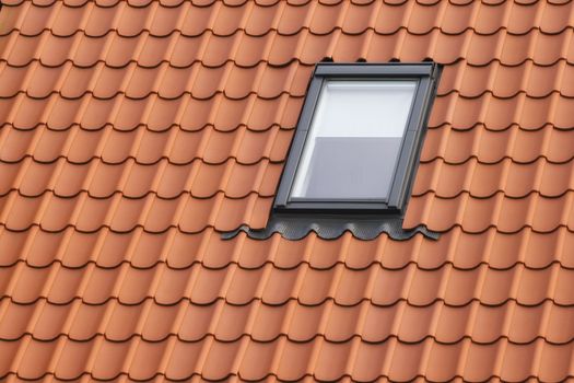Roof with red tiling and dormer