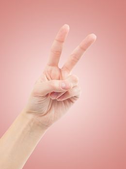 Hand with two fingers up in the peace or victory symbol. Also the sign for the letter V in sign language.