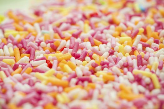 Sugar sprinkles as a background. Soft focus.