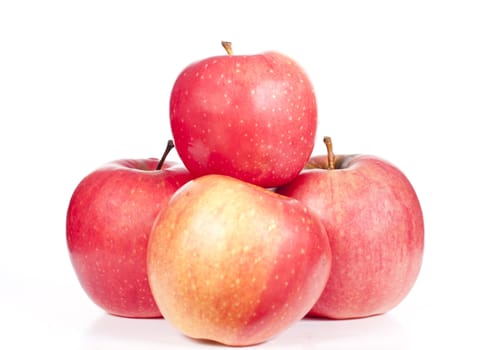 juicy red apples on a white background