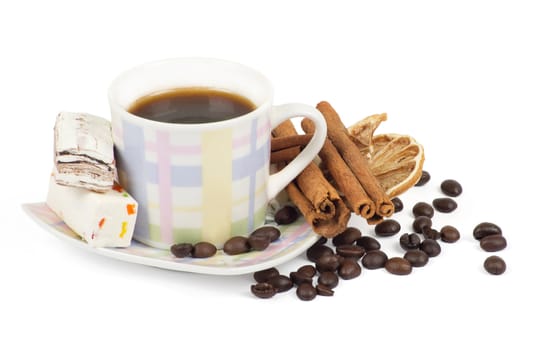 Cup of coffee with ingredients on a white background
