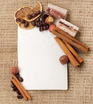 Menu Design.Old paper, coffee bean, cinnamon, lemon, burlap.