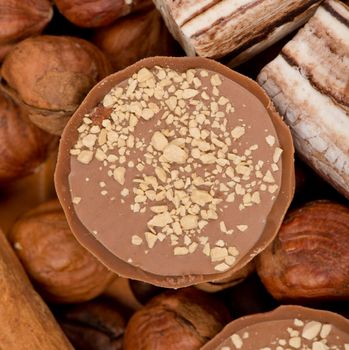 Closeup of coffee beans, cinnamon and nuts