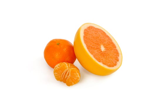 image of a fresh whole tangerines and orange isolated on white