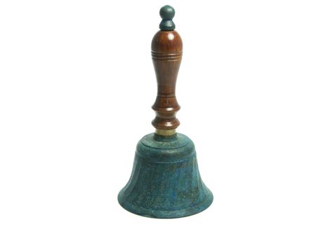 green metal and wooden bell on isolated white