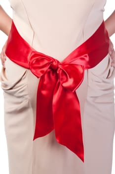 Pregnant Woman's Belly with Red Ribbon, closeup
