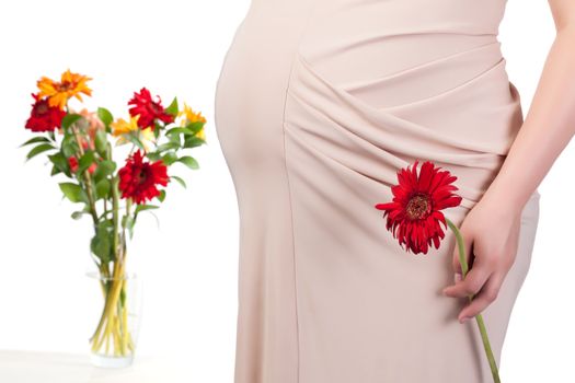 Pregnant Woman with Flowers, over white background
