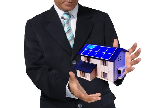 Business Man holding house or home