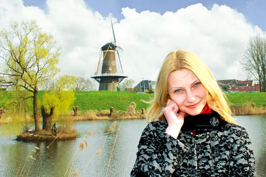 Girl on the waterfront in the Dutch town of Gorinchem. Netherlands