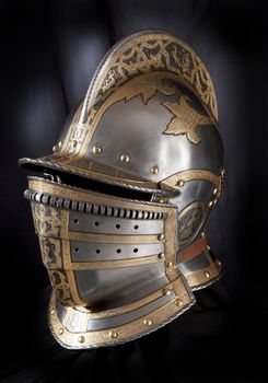 Iron helmet of the medieval knight. Very heavy headdress.