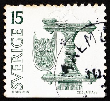 SWEDEN - CIRCA 1975: a stamp printed in the Sweden shows Scabbard and Hilt, Treasures from Vendel Period, circa 1975