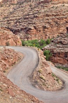 steep switchback road to canyon bottom near Moab, Utah