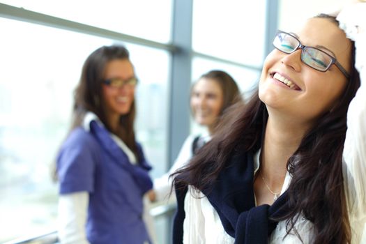 Student meeting smiley girl face on foreground 