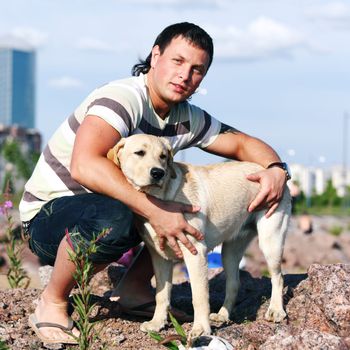 man and dog blue sky on background