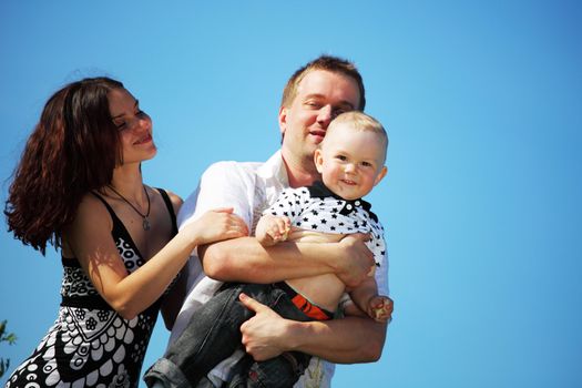 happy family blue sky on background