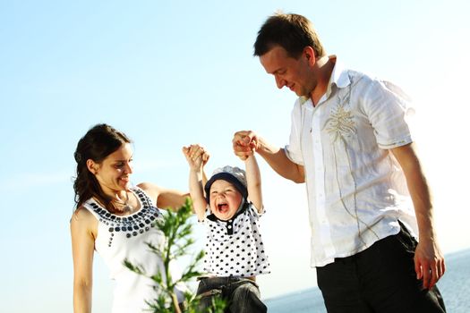 happy family blue sky on background