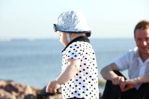 happy family on picnic sea on background