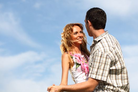 man and woman dance in the sky