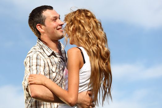man and woman dance in the sky