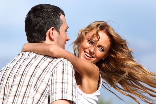 man and woman dance in the sky