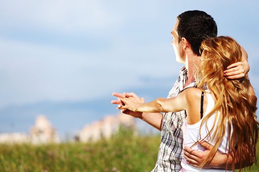 man and woman see houses and new flat