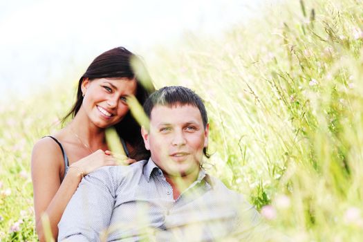 two lovers on grass field