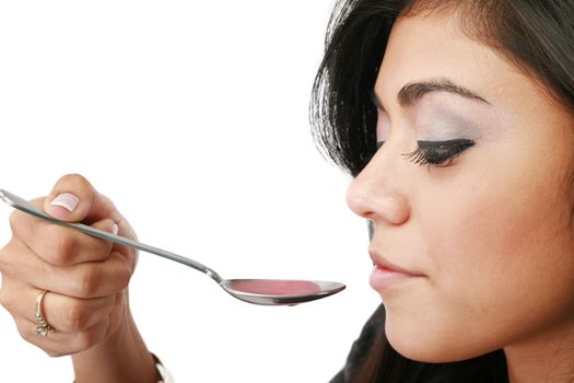 Young woman taking a medicine