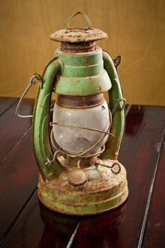 Vintage lamp isolated on wood table background