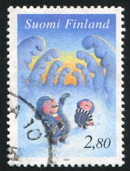 FINLAND - CIRCA 1994: stamp printed by Finland, shows Father and Son Looking for Christmas Tree, circa 1994