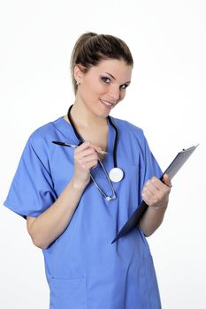 woman doctor in uniforme with pen and stethoscope