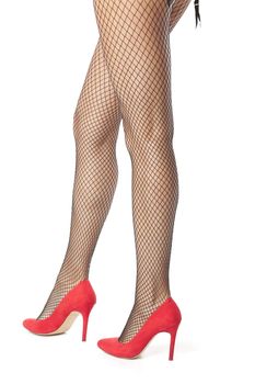 Sexy girl legs in fishnet stocking posing