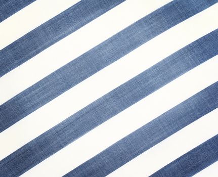 White  fabric texture with diagonal stripes. Close up
