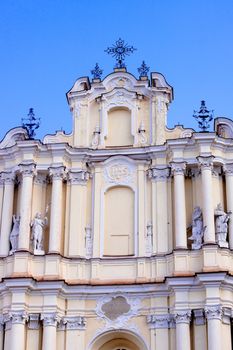 A pink church and blue sky in Vilnius
