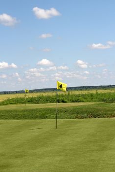 two golf yellow flag