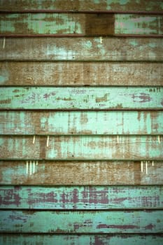 Texture of Green Old Cracked wood Plank wall