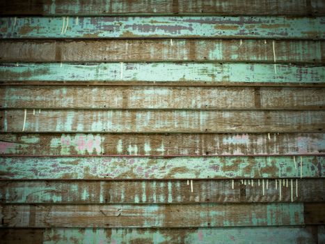 Texture of Green Old Cracked wood Plank wall Horizontal