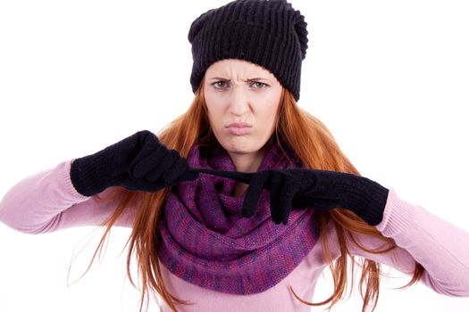 young beautiful woman with hat gloves and scarf in winter isolated on white