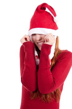 smiling young woman at christmastime in red clothes isolated on white