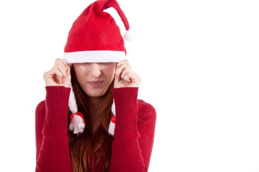 smiling young woman at christmastime in red clothes isolated on white