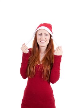 smiling young woman at christmastime in red clothes isolated on white