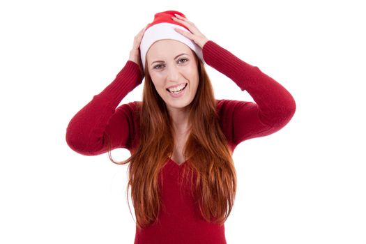 smiling young woman at christmastime in red clothes isolated on white